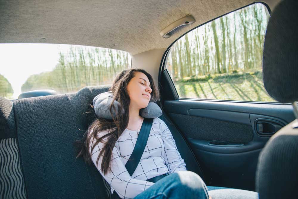 How To Sleep Comfortably in The Backseat of a Car