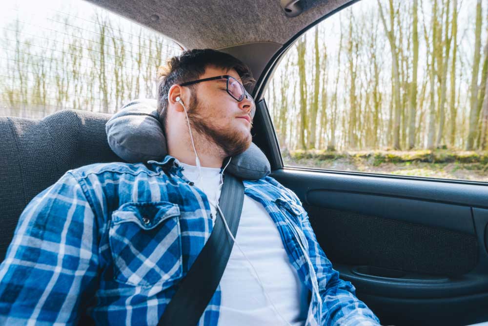 How To Sleep Comfortably in The Backseat of a Car
